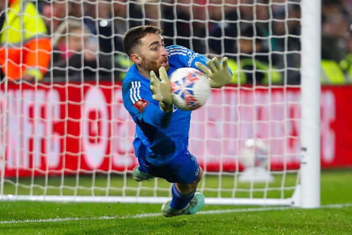 Nottingham Forest keeper Matt Turner pictured saving a penalty kick in an FA Cup shootout against Bristol City in February 2024